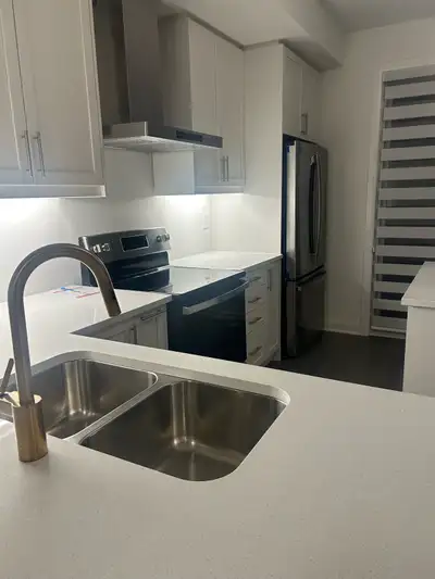 Private room furnished with a bed Lakefront view bright windows Shared washroom and kitchen Male alo...