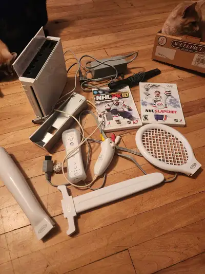 Like new, kids never played it and replaced with switch couple games and attachments plays game cube...