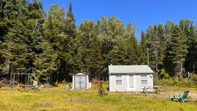 82,500-square-foot lot with rustic electrified shelter