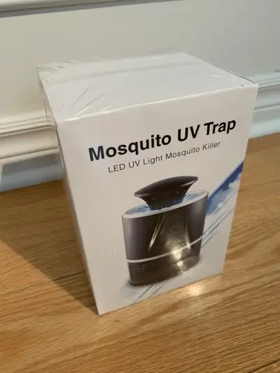 Brand new in box Mosquito UV Trap is a USB-powered pest control device that uses UV light and a powe...