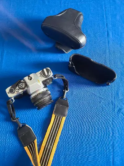Excellent condition. Includes a 50mm lens with UV filter and soft case. Many additional lenses also...