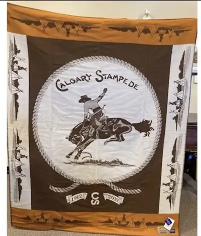 Offered for sale is an exceptionally rare 2012 Calgary Stampede Centennial Pendleton wool blanket, p...