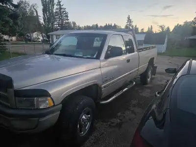 2ool dodge 2500 4x4 either fix or use as parts. it still moves but torque converter is no good will...
