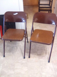Two folding chairs 
