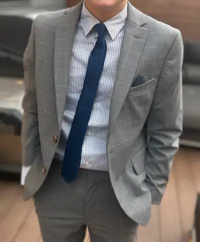 This beautiful Ralph Lauren suit was purchased at the The Bay for $360. - Size 14 youth. - It is lig...