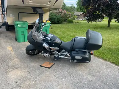 I am selling my 2004 BMW 1200 motorcycle, which has under 11000 miles on it, is wraped black. This m...