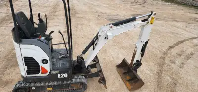 Bobcat E20 for rent. FREE delivery within 20 km. Tracks narrow from 42" to 35.5" to get through narr...