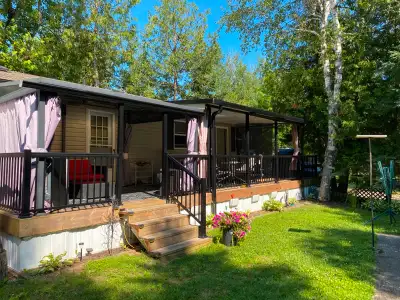 2018 - General Coach - 40 foot- Huron Ridge Manor Park Model- 491 sq feet of inside living space Thi...