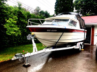 23 ft Cruiser and EZ Loader trailer - Boat sleeps 4