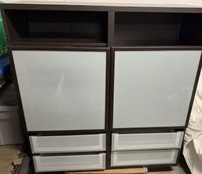 This is a Ikea Pax wardrobe system, perfect for adding stylish storage to any room. It features a sl...