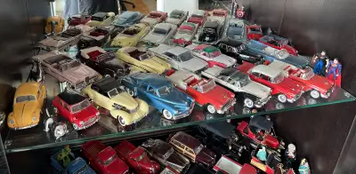 Franklin and Danbury Mint diecast model cars. Downsizing my collection. Price $100+ per car