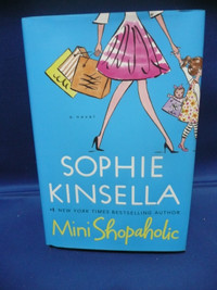 FICTION BOOKS - SOPHIE KINSELLA - Mini shopoholic - $3.00