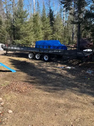 30’ Deck Over Trailer. This thing is a beast. Tires and axles are newer. Frame was reinforced by a p...