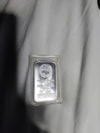 1 oz. 99.9 % silver bar for sale market price very good condition in plastic sleeve usa. Going for m...