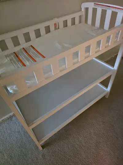 Baby change table with storage for sale. Like new condition, View more