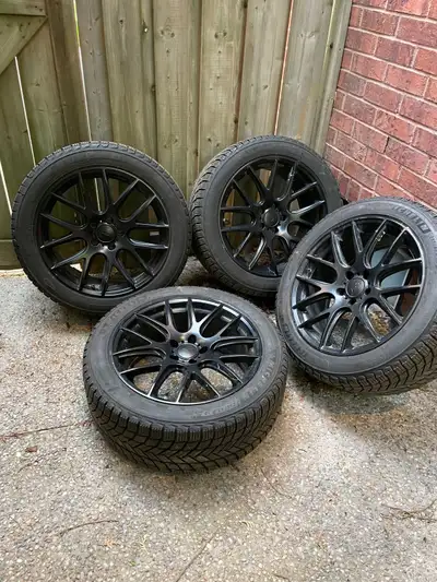 Michelin Xice snow tires with alloy rims. Used for one season. Was on Tesla model Y.