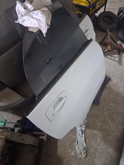 2 rear doors for wrx sedan aspen white. Purchased at jdm racing in mtl paid 125 each selling both 15...