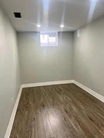 The furnished private room with utilities included in the basement. Parking available with extra pay...
