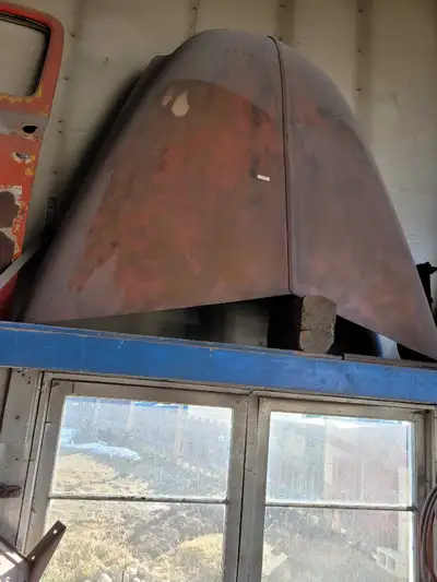 1949 to 1953 GMC hood, some surface rust and minor dings, includes hood hinges.