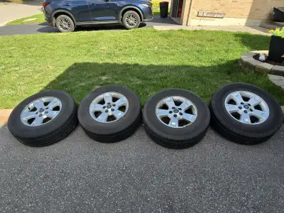 Selling a full set of 4 OEM Ford 16" alloy rims with mounted tires. Details: OEM Ford 16" alloy rims...