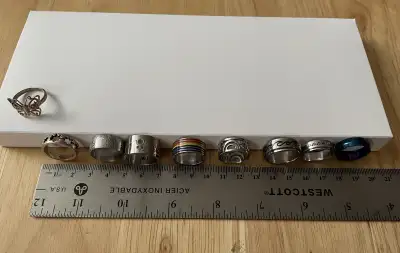 Stainless steel rings. All in great condition, some like new. All are ring size 6. $15 each. Butterf...