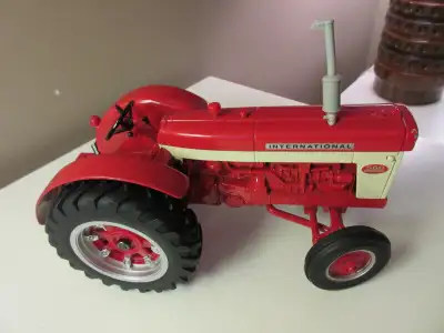 Case IH 560 Red toy Tractor, made in 1999, pick up only., View more