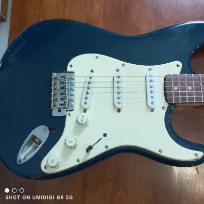 95 Fender Stratocaster Squire Body with New NECK , body has a few dings and stratches , works fine ,...