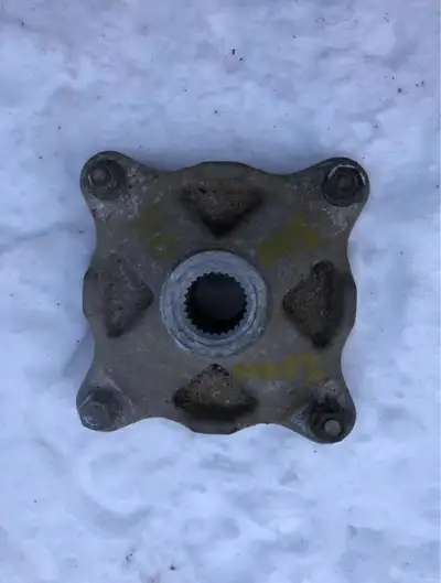 This is the rear hub or brake hub or wheel hub that came off 2000 Polaris Sportsman 500 Atv part num...