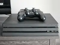 Ps4 pro + two controllers + power cable
