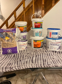 assorted cement repair + dry wall compound  