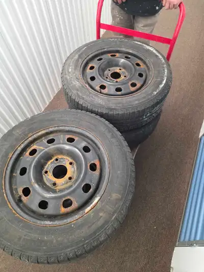 tires and hub caps for dodge caravan , View more