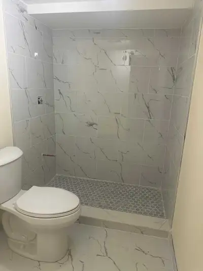 Newly renovated basement with 4 bedrooms and 2 bathrooms and a kitchen with 2 parking space located...