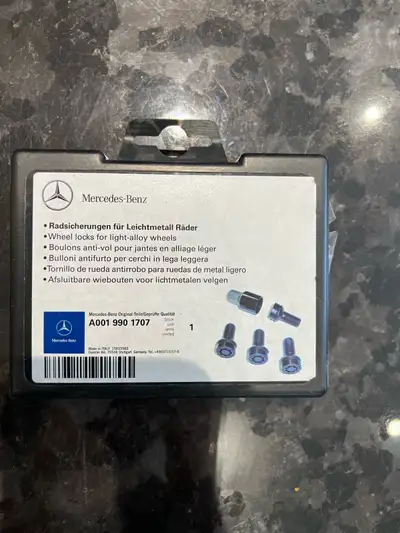 NEW Mercedes-Benz Rim Locks /Wheel Locks for light alloy wheels A001 990 1707 Buyer to confirm this...