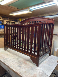 Dark wood crib