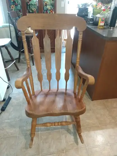Solid wood rocking chair, good condition $35, View more