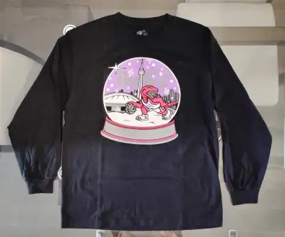Drake’s OVO brand long sleeved t-shirt from the Toronto Raptors first Christmas Day game in Toronto...