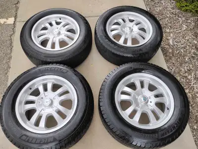 Tires and rims in excellent condition. Back tires are 265/60R18 and front tires are 235/65R18. 5/5X5...