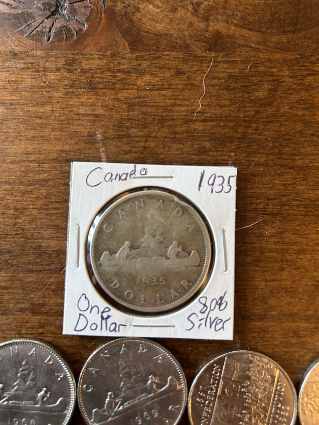 1935 Canadian Siler dollar plus 20 Canadian nickel dollars 1968  in Arts & Collectibles in St. Catharines - Image 2
