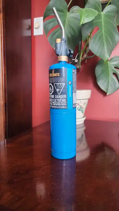 Ignite your DIY dreams with this Bernzomatic propane torch! This used torch is ready to tackle any t...