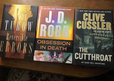 3 Hard Cover Fiction Books, View more