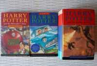 3 Harry Potter Books and Placemat Trivia games
