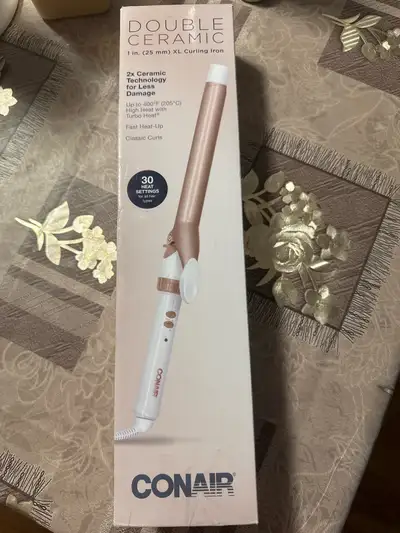 Achieve beautiful, classic curls with this Conair Double Ceramic 1-inch XL Curling Iron, featuring 2...