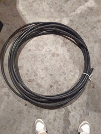 Black plastic hose for outdoor plumbing
