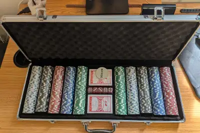 All chips, dice, and cards are still wrapped/sealed. Comes in hard case and with dealer button. -- C...