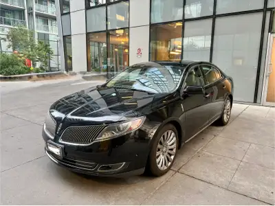 Low mileage - Black Lincoln MKS sedan has a leather interior and multi-spoke alloy wheels. Mileage:...