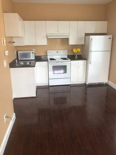 1 Bedroom Coach House available corner house in a quiet intersection. Utilities included. In-suite l...