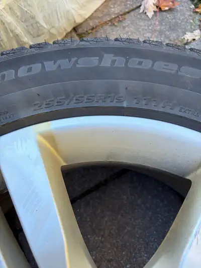 These used Falken 255/55R19 111H winter tires are mounted on Mercedes wheels and are ready to help y...