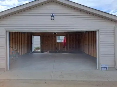 Two-car 22×22×11 garage for rent in Walden, Calgary. Safe neighbourhood. Garage is fitted with garag...