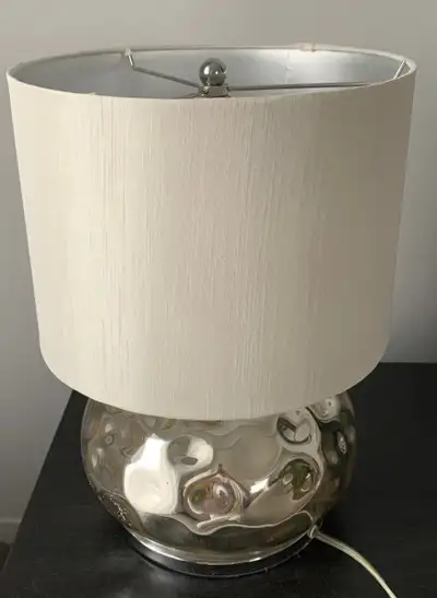 A table lamp for sale., View more