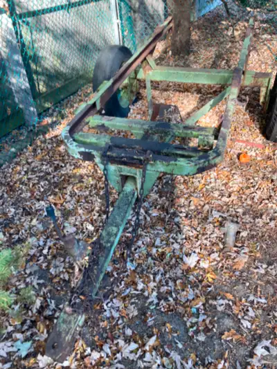 Heavy duty trailer frame with adjustable rear axle width . Might have been a farm trailer. Very soli...